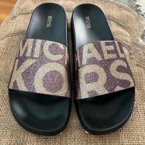 Michael Kora slides pink and gold glitter